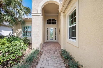 Welcome to this exceptional Porta Rosa villa, nestled within on Shadow Wood Preserve in Florida - for sale on GolfHomes.com, golf home, golf lot