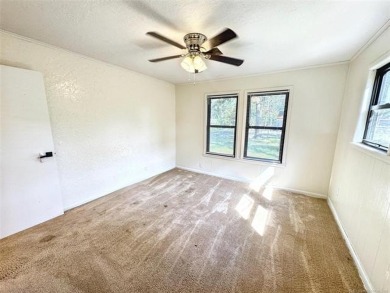 Welcome to lake life in Taylor Ferry! This super quiet on Sequoyah State Park Golf Course in Oklahoma - for sale on GolfHomes.com, golf home, golf lot