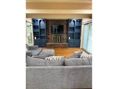 Spacious 4 bedroom, 4.5 bath side-to-side split located in a on Leawood South Country Club in Kansas - for sale on GolfHomes.com, golf home, golf lot