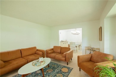 Spacious 4 bedroom, 4.5 bath side-to-side split located in a on Leawood South Country Club in Kansas - for sale on GolfHomes.com, golf home, golf lot