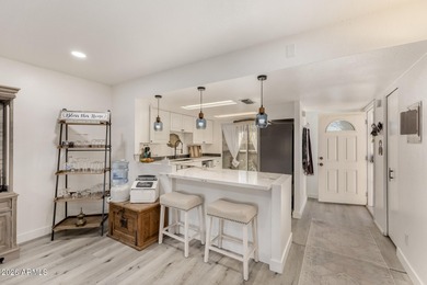 Enjoy relaxed living in this charming patio home positioned on Fountain of the Sun Country Club in Arizona - for sale on GolfHomes.com, golf home, golf lot