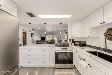 Enjoy relaxed living in this charming patio home positioned on Fountain of the Sun Country Club in Arizona - for sale on GolfHomes.com, golf home, golf lot