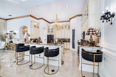 Welcome to 7409 Gathering Ct, a fully remodeled Mediterranean on  in Florida - for sale on GolfHomes.com, golf home, golf lot