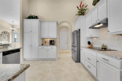 Stunning solid block construction home features a split floor on Meadowood Golf and Tennis Club in Florida - for sale on GolfHomes.com, golf home, golf lot