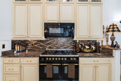 Welcome to 7409 Gathering Ct, a fully remodeled Mediterranean on  in Florida - for sale on GolfHomes.com, golf home, golf lot