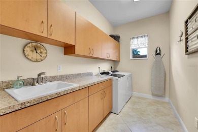 Stunning solid block construction home features a split floor on Meadowood Golf and Tennis Club in Florida - for sale on GolfHomes.com, golf home, golf lot