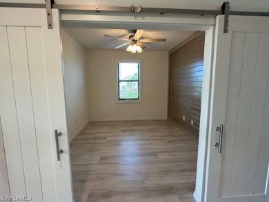 All Impact Windows, custom pool home is on a corner lot with a on Gateway Golf and Country Club in Florida - for sale on GolfHomes.com, golf home, golf lot