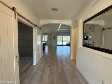 All Impact Windows, custom pool home is on a corner lot with a on Gateway Golf and Country Club in Florida - for sale on GolfHomes.com, golf home, golf lot