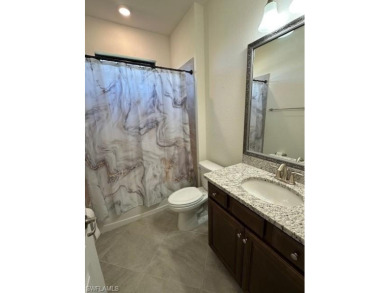 All Impact Windows, custom pool home is on a corner lot with a on Gateway Golf and Country Club in Florida - for sale on GolfHomes.com, golf home, golf lot