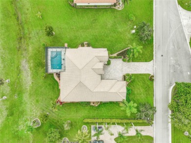 Stunning solid block construction home features a split floor on Meadowood Golf and Tennis Club in Florida - for sale on GolfHomes.com, golf home, golf lot