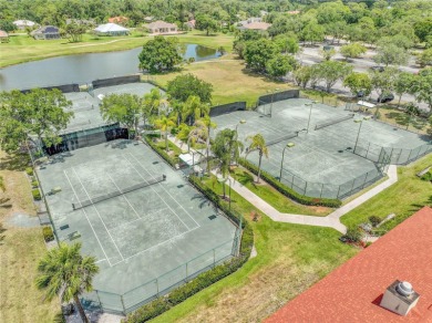 Stunning solid block construction home features a split floor on Meadowood Golf and Tennis Club in Florida - for sale on GolfHomes.com, golf home, golf lot
