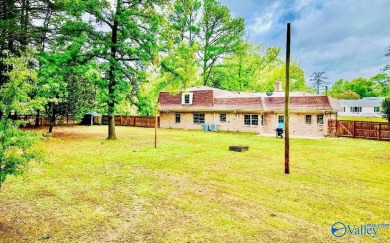 A Stunning 4 bedroom home that sits on an oversized corner lot on Burningtree Country Club in Alabama - for sale on GolfHomes.com, golf home, golf lot