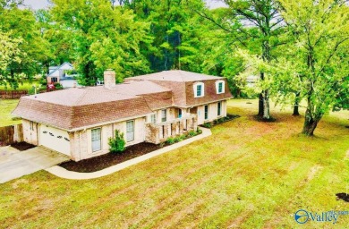 A Stunning 4 bedroom home that sits on an oversized corner lot on Burningtree Country Club in Alabama - for sale on GolfHomes.com, golf home, golf lot