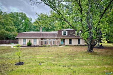 A Stunning 4 bedroom home that sits on an oversized corner lot on Burningtree Country Club in Alabama - for sale on GolfHomes.com, golf home, golf lot