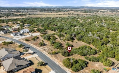 Bring your dream home to life amongst 1,000 acres of rolling on Vaaler Creek Golf Club in Texas - for sale on GolfHomes.com, golf home, golf lot