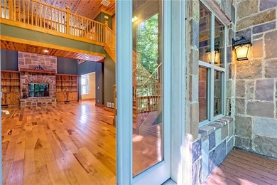 Welcome to this magnificent custom mountain lodge home on 10.54 on Waterfall Country Club in Georgia - for sale on GolfHomes.com, golf home, golf lot