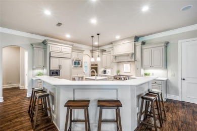 Discover an exquisite custom home in The Estates at Tour 18, a on Tour 18 Golf Course Dallas in Texas - for sale on GolfHomes.com, golf home, golf lot