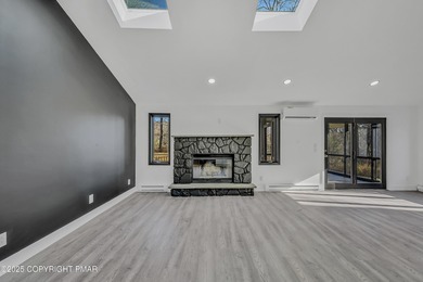 Welcome to this beautifully finished modern ranch in the heart on Pocono Farms Country Club in Pennsylvania - for sale on GolfHomes.com, golf home, golf lot