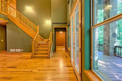 Welcome to this magnificent custom mountain lodge home on 10.54 on Waterfall Country Club in Georgia - for sale on GolfHomes.com, golf home, golf lot