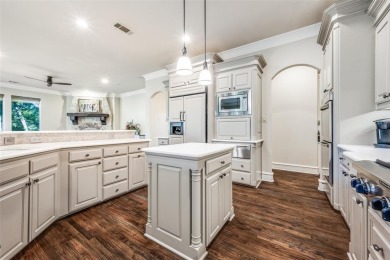 Discover an exquisite custom home in The Estates at Tour 18, a on Tour 18 Golf Course Dallas in Texas - for sale on GolfHomes.com, golf home, golf lot