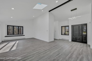 Welcome to this beautifully finished modern ranch in the heart on Pocono Farms Country Club in Pennsylvania - for sale on GolfHomes.com, golf home, golf lot