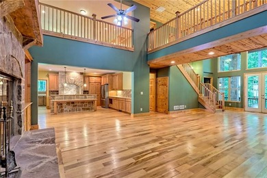 Welcome to this magnificent custom mountain lodge home on 10.54 on Waterfall Country Club in Georgia - for sale on GolfHomes.com, golf home, golf lot
