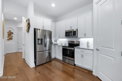 THE BEST END UNIT IS WAITING FOR YOU! This 2 bedroom, 2 bath on Plantation Bay Golf and Country Club in Florida - for sale on GolfHomes.com, golf home, golf lot
