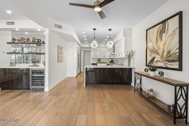 Beautifully updated home located in the exclusive guard-gated on Troon Country Club in Arizona - for sale on GolfHomes.com, golf home, golf lot