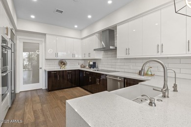 Beautifully updated home located in the exclusive guard-gated on Troon Country Club in Arizona - for sale on GolfHomes.com, golf home, golf lot