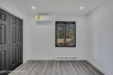 Welcome to this beautifully finished modern ranch in the heart on Pocono Farms Country Club in Pennsylvania - for sale on GolfHomes.com, golf home, golf lot