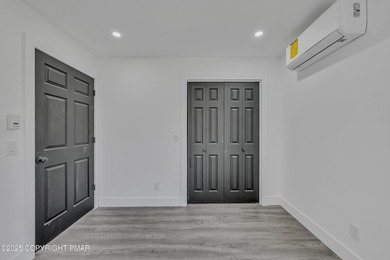 Welcome to this beautifully finished modern ranch in the heart on Pocono Farms Country Club in Pennsylvania - for sale on GolfHomes.com, golf home, golf lot