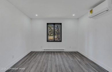 Welcome to this beautifully finished modern ranch in the heart on Pocono Farms Country Club in Pennsylvania - for sale on GolfHomes.com, golf home, golf lot