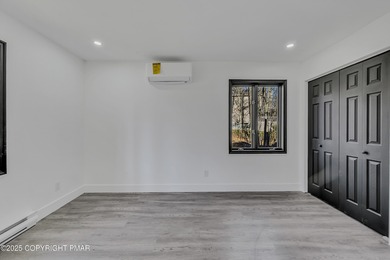 Welcome to this beautifully finished modern ranch in the heart on Pocono Farms Country Club in Pennsylvania - for sale on GolfHomes.com, golf home, golf lot