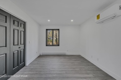 Welcome to this beautifully finished modern ranch in the heart on Pocono Farms Country Club in Pennsylvania - for sale on GolfHomes.com, golf home, golf lot