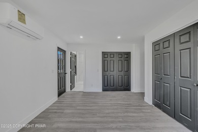 Welcome to this beautifully finished modern ranch in the heart on Pocono Farms Country Club in Pennsylvania - for sale on GolfHomes.com, golf home, golf lot