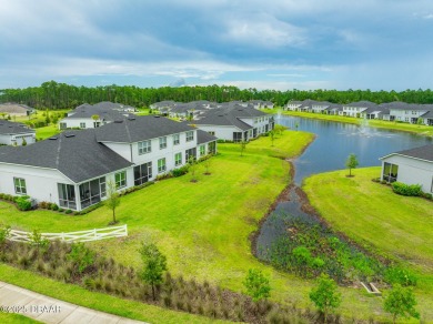 THE BEST END UNIT IS WAITING FOR YOU! This 2 bedroom, 2 bath on Plantation Bay Golf and Country Club in Florida - for sale on GolfHomes.com, golf home, golf lot