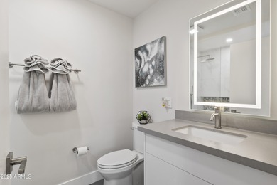 Beautifully updated home located in the exclusive guard-gated on Troon Country Club in Arizona - for sale on GolfHomes.com, golf home, golf lot