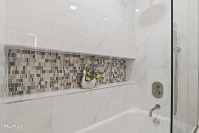 Beautifully updated home located in the exclusive guard-gated on Troon Country Club in Arizona - for sale on GolfHomes.com, golf home, golf lot