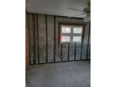 *CASH ONLY* Being sold as-is for land value, renovation or new on The Renaisssance Vinoy Golf Club in Florida - for sale on GolfHomes.com, golf home, golf lot