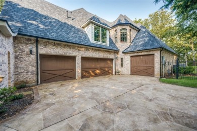 Discover an exquisite custom home in The Estates at Tour 18, a on Tour 18 Golf Course Dallas in Texas - for sale on GolfHomes.com, golf home, golf lot