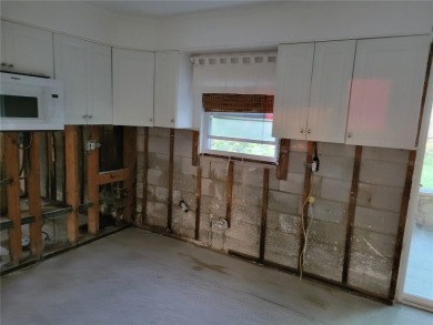 *CASH ONLY* Being sold as-is for land value, renovation or new on The Renaisssance Vinoy Golf Club in Florida - for sale on GolfHomes.com, golf home, golf lot
