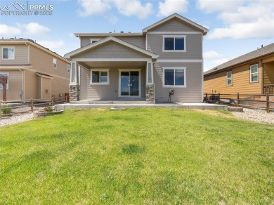 This exquisite two-story residence in Meridian Ranch presents on Antler Creek Golf Course in Colorado - for sale on GolfHomes.com, golf home, golf lot