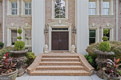 Spectacular brick custom built estate located on the Golf Club on The Golf Club of Georgia in Georgia - for sale on GolfHomes.com, golf home, golf lot