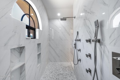 Beautifully updated home located in the exclusive guard-gated on Troon Country Club in Arizona - for sale on GolfHomes.com, golf home, golf lot