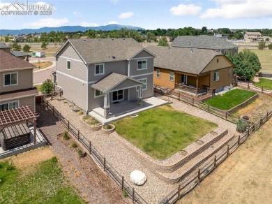 This exquisite two-story residence in Meridian Ranch presents on Antler Creek Golf Course in Colorado - for sale on GolfHomes.com, golf home, golf lot