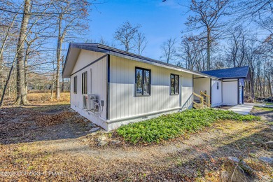 Welcome to this beautifully finished modern ranch in the heart on Pocono Farms Country Club in Pennsylvania - for sale on GolfHomes.com, golf home, golf lot
