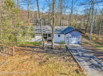 Welcome to this beautifully finished modern ranch in the heart on Pocono Farms Country Club in Pennsylvania - for sale on GolfHomes.com, golf home, golf lot