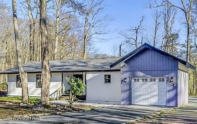 Welcome to this beautifully finished modern ranch in the heart on Pocono Farms Country Club in Pennsylvania - for sale on GolfHomes.com, golf home, golf lot