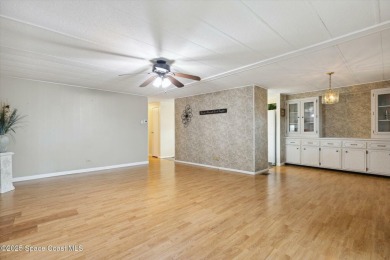 Welcome to Barefoot Bay! This 2 bedroom, 2 bath home is walking on Barefoot Bay Golf Course in Florida - for sale on GolfHomes.com, golf home, golf lot