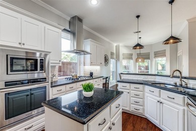 From the moment you drive up, it's clear this home is set apart on Stonebridge Ranch Country Club in Texas - for sale on GolfHomes.com, golf home, golf lot